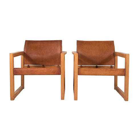 #437 Pair of Leather “Safari” Chairs